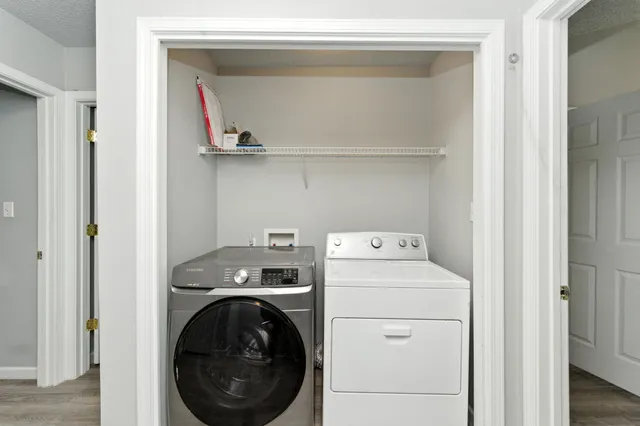 a utility room with dryer and washer