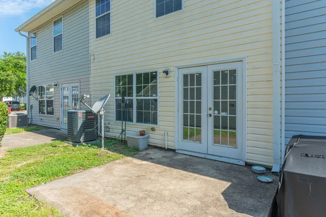 a house view with a backyard space