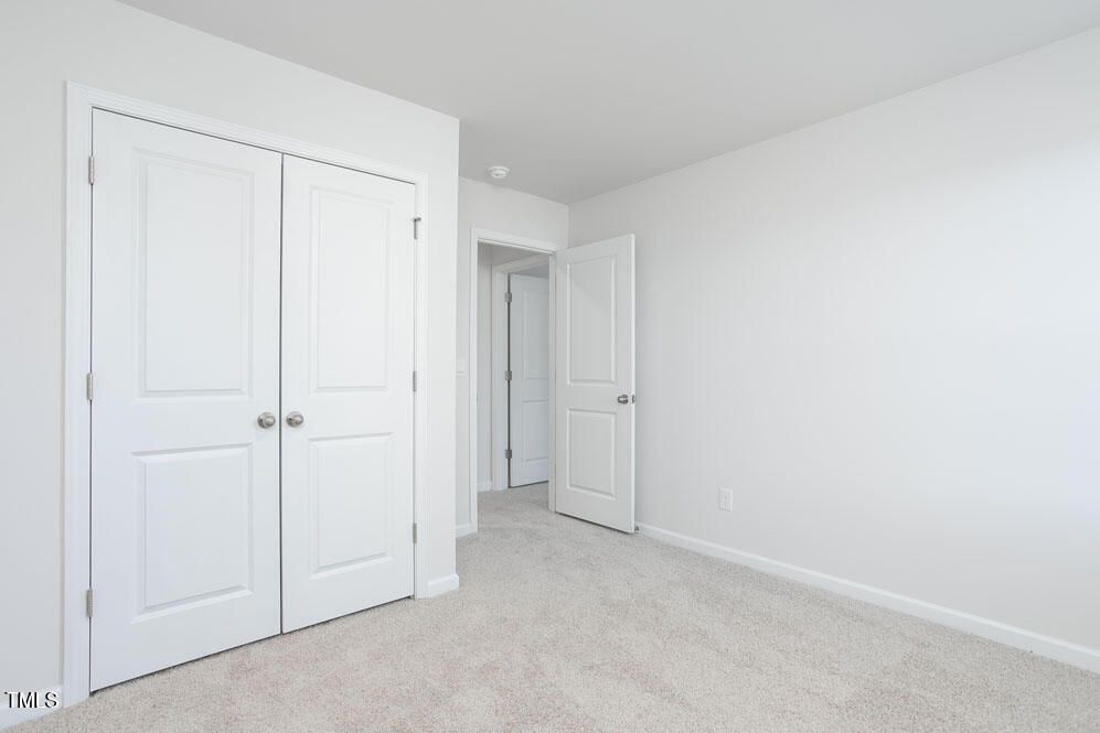 6024 Howth Way Raleigh, NC 27610 - Photo 18 of 22 a view of an empty room