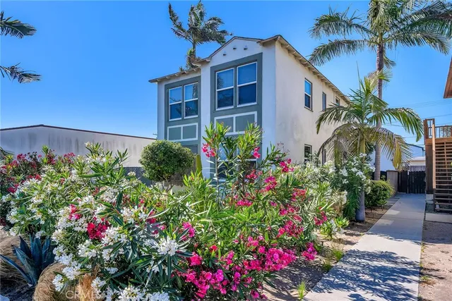 a flower plants with wooden fence