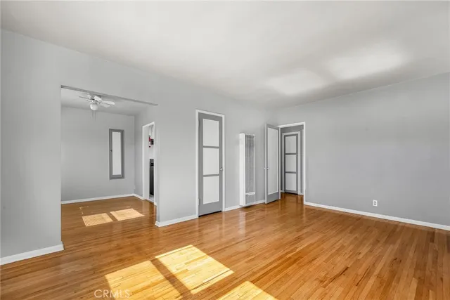 a view of kitchen and wooden floor