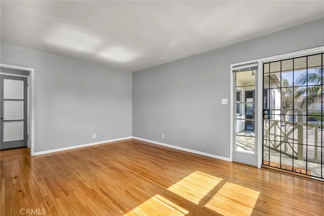 a kitchen with white cabinets and a sink