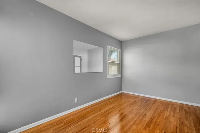 a bedroom with a bed and bathroom
