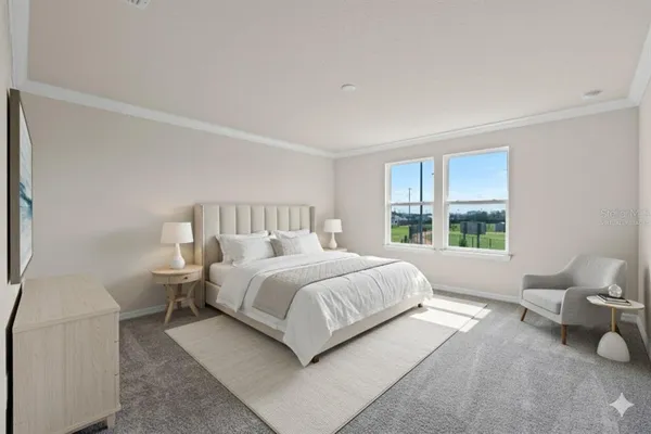 a bedroom with a bed and window