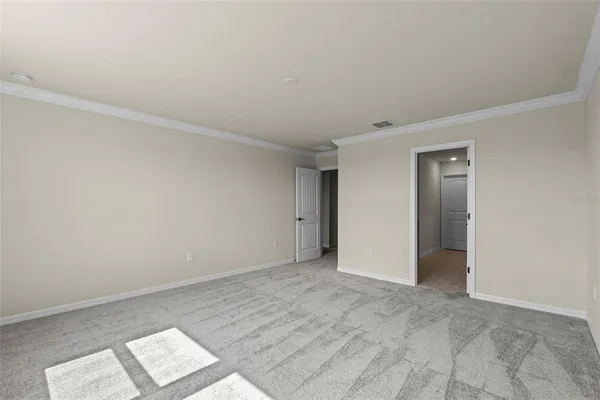 a view of an empty room and window