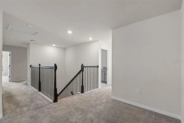 a view of hallway with stairs