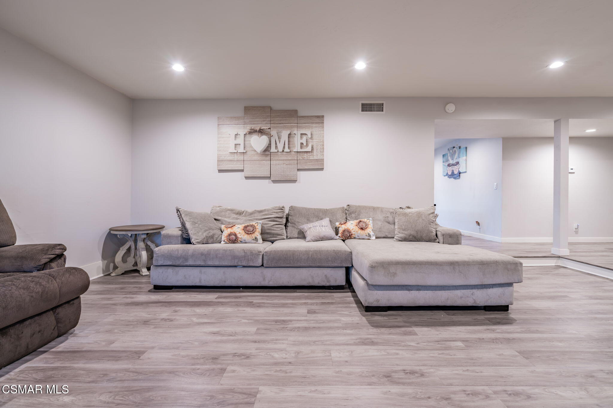 761 Lyons Court Simi Valley, CA 93065 - Photo 13 of 61 a living room with furniture and a couch