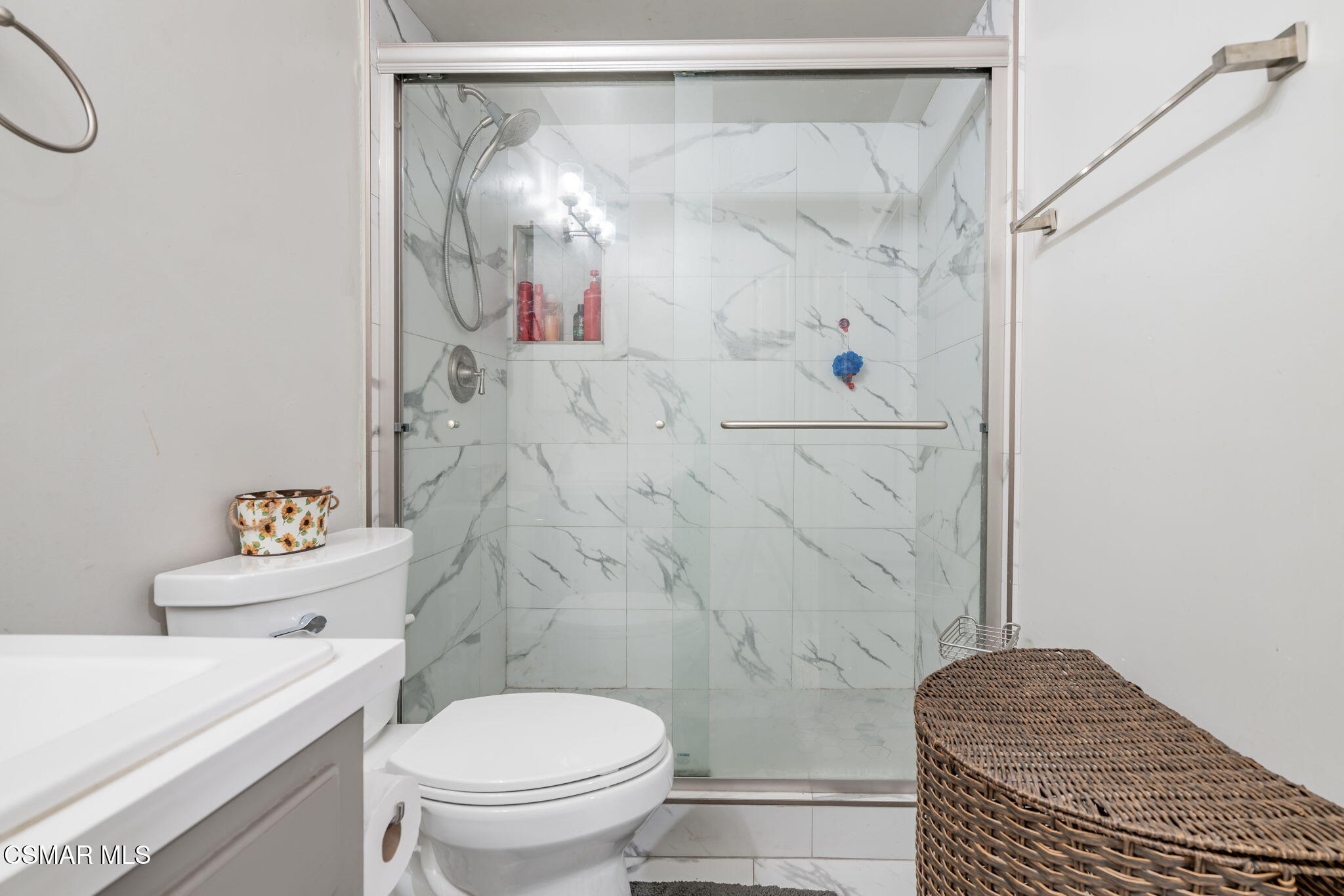 761 Lyons Court Simi Valley, CA 93065 - Photo 32 of 61 a bathroom with a shower a toilet and a shower