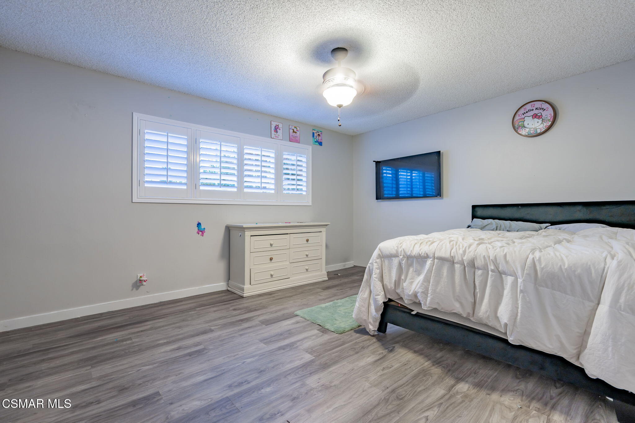 761 Lyons Court Simi Valley, CA 93065 - Photo 33 of 61 a bedroom with a bed and a window