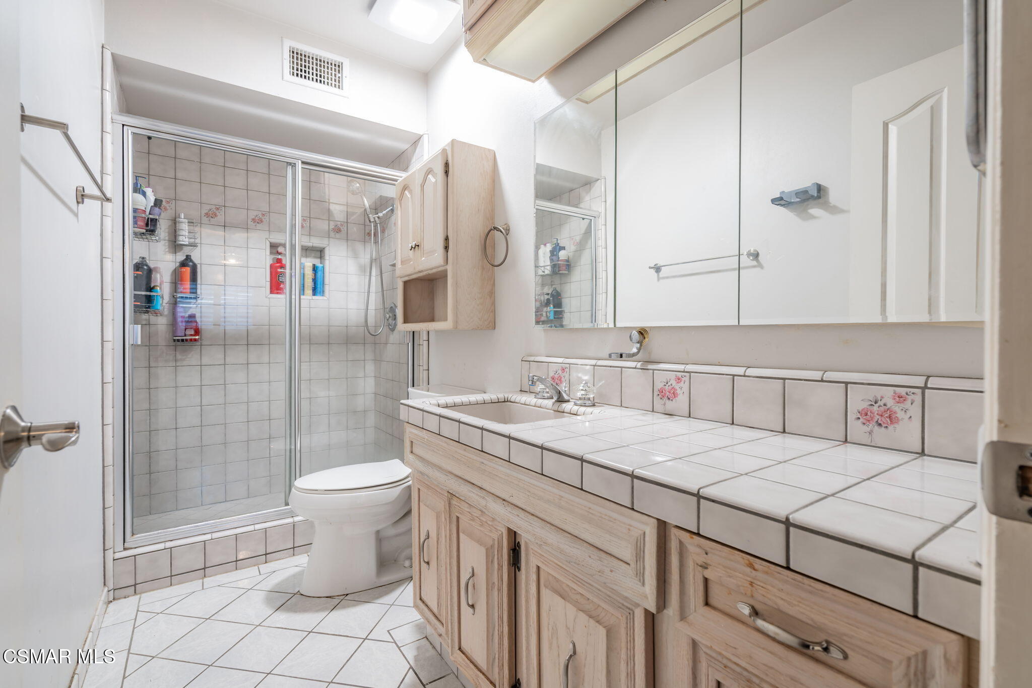 761 Lyons Court Simi Valley, CA 93065 - Photo 40 of 61 a bathroom with a sink toilet and shower