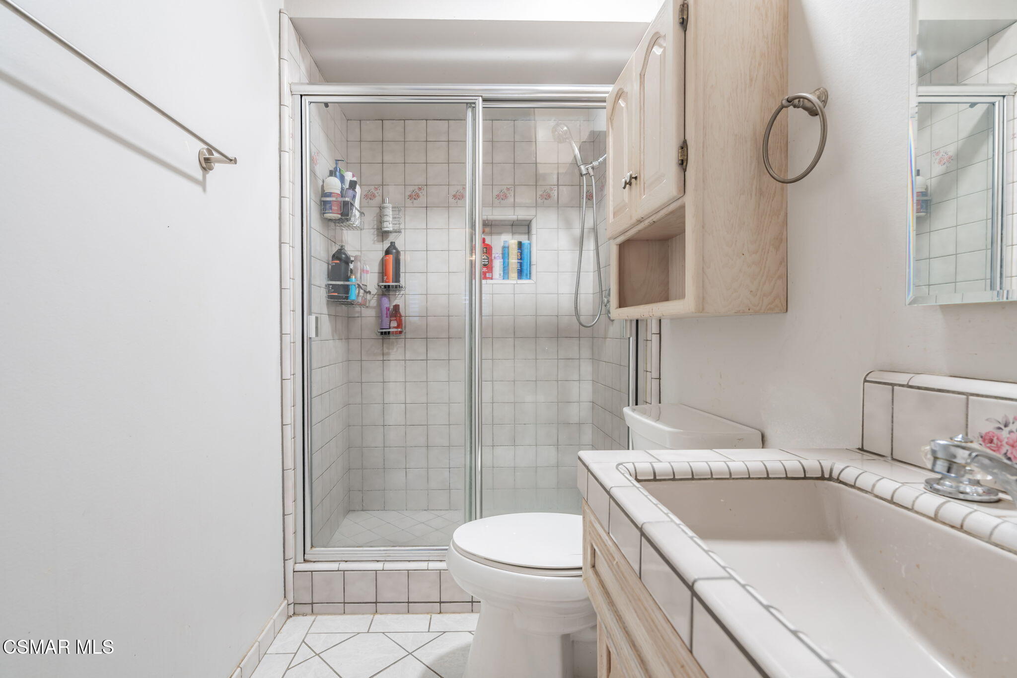 761 Lyons Court Simi Valley, CA 93065 - Photo 41 of 61 a bathroom with a sink a toilet and shower