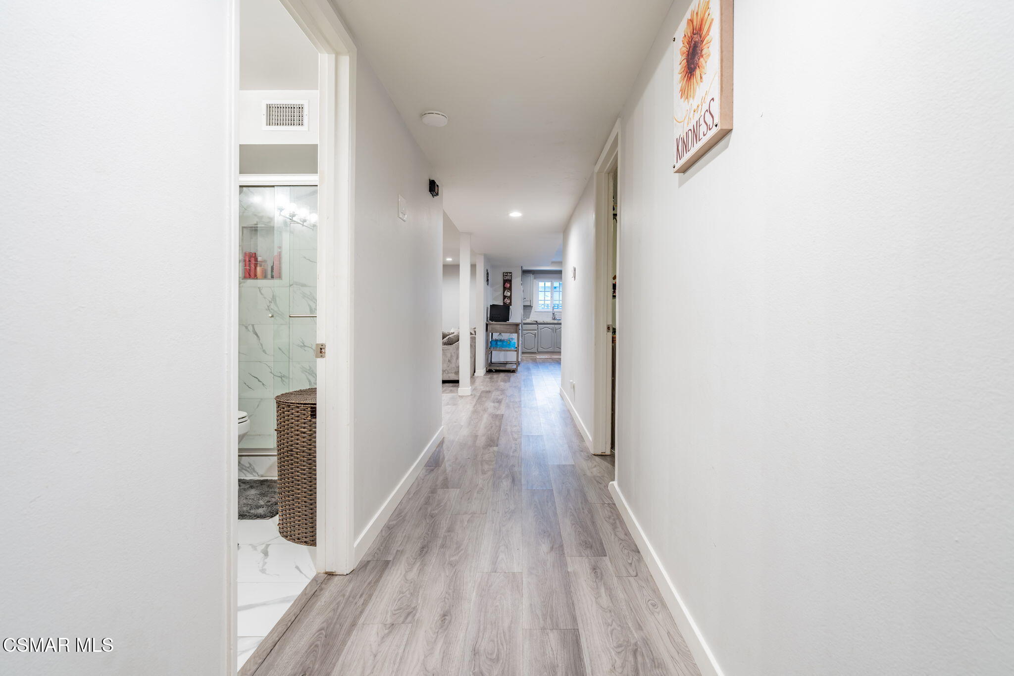 761 Lyons Court Simi Valley, CA 93065 - Photo 42 of 61 a view of a hallway with wooden floor and staircase
