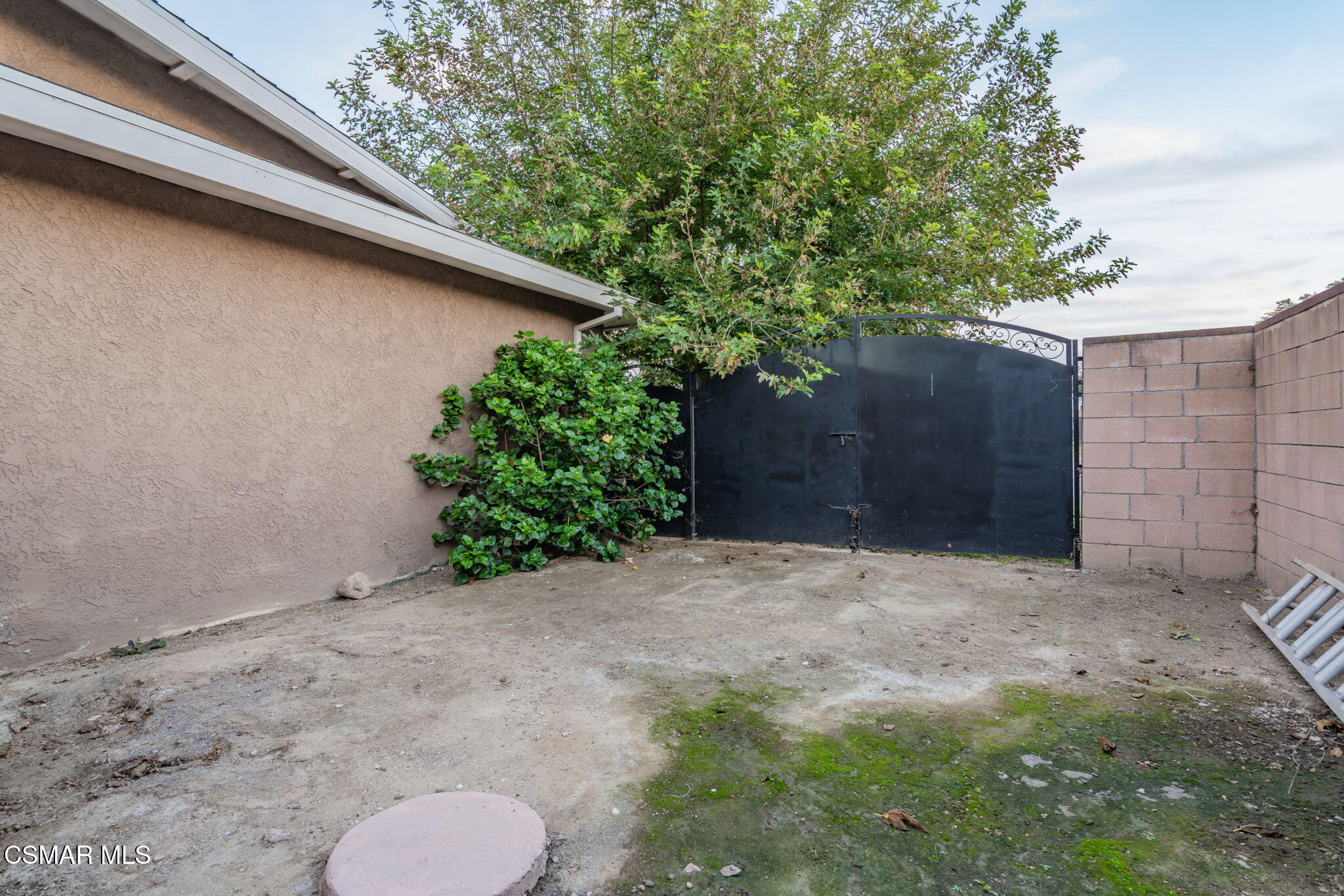 761 Lyons Court Simi Valley, CA 93065 - Photo 54 of 61 a backyard of a house with plants and trees