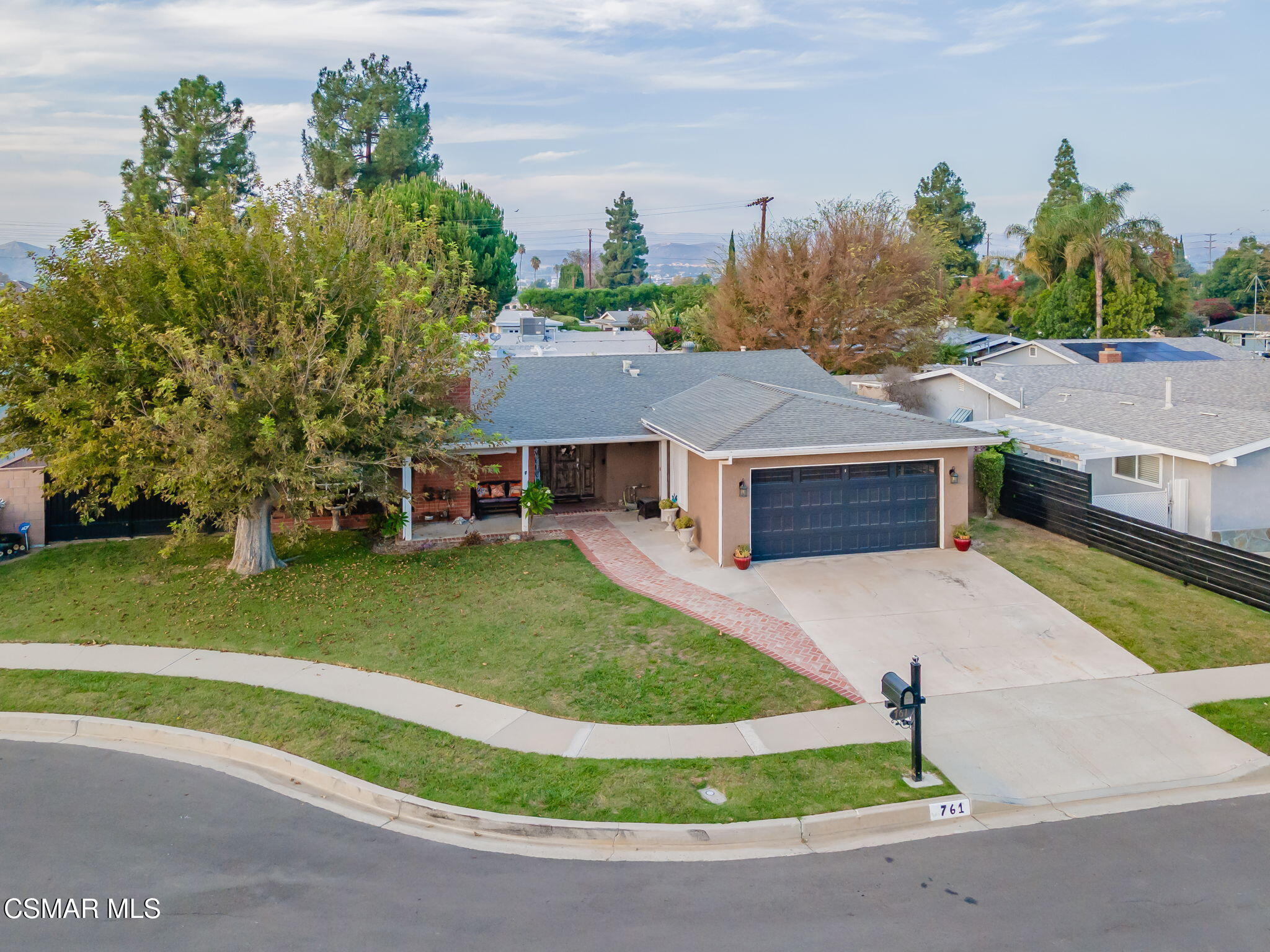 761 Lyons Court Simi Valley, CA 93065 - Photo 59 of 61 a view of a house with a swimming pool and a yard
