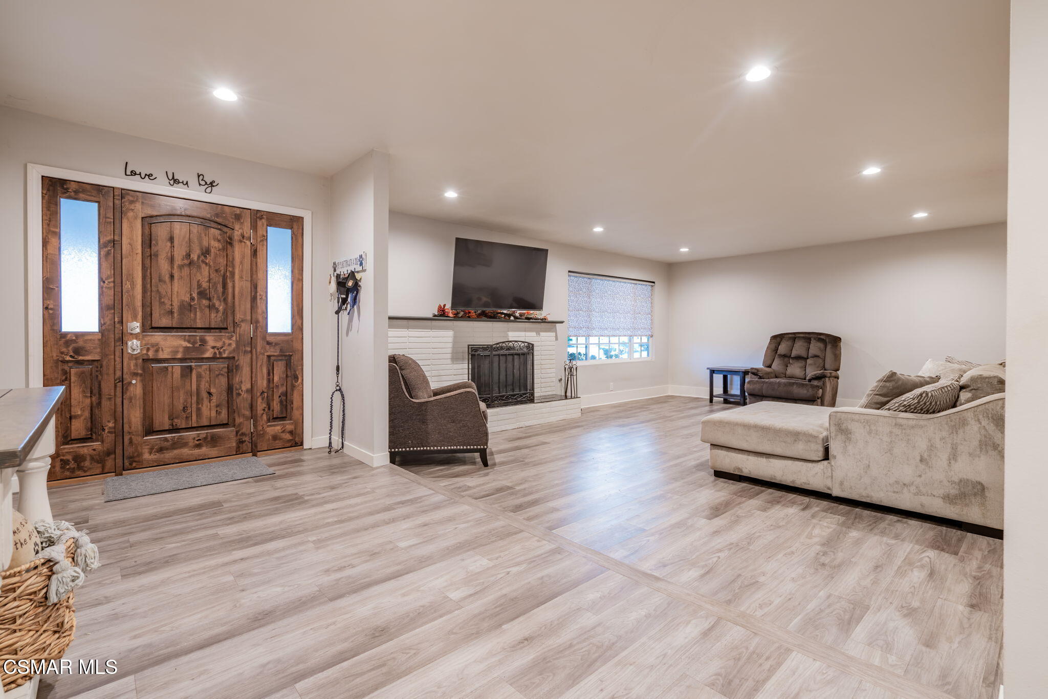 761 Lyons Court Simi Valley, CA 93065 - Photo 9 of 61 a living room with furniture and a wooden floor
