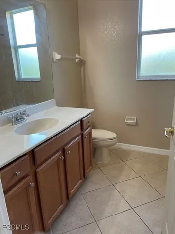 a kitchen with stainless steel appliances a refrigerator sink and cabinets