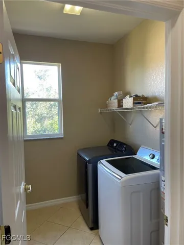 a kitchen with a cabinets and steel appliances