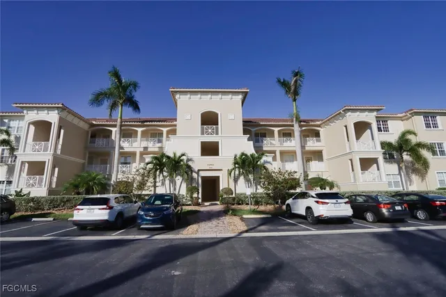 a view of a street with cars