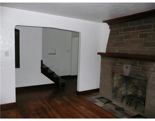 790 Ridge Road Ambridge, PA 15003 - Photo 3 of 12 Living Room. Some of the wonderful features of the spacious living room includes original hardwood floors and wood burning stone fireplace. Don t miss the beautiful inlaid tile work in front of fireplace.