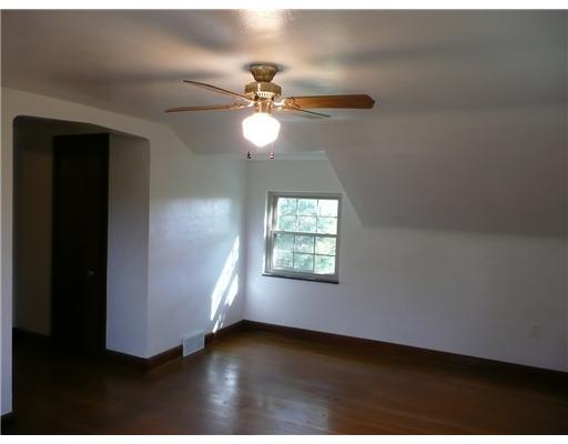 790 Ridge Road Ambridge, PA 15003 - Photo 6 of 12 Master Bedroom. Spacious master bedroom has a large walk in closet and sitting room attached. Enjoy the hardwood floors, ceiling fan and new windows.