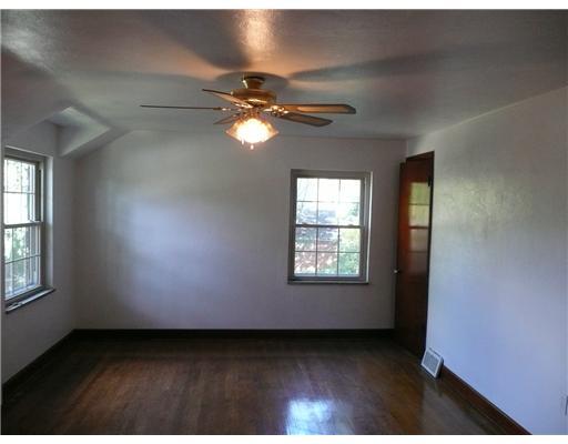 790 Ridge Road Ambridge, PA 15003 - Photo 7 of 12 Other. One of three bedrooms freshly painted with ceiling fan, hardwood floors, ample closet space and new windows.