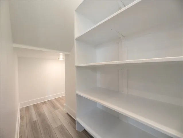 a view of an empty walk in closet