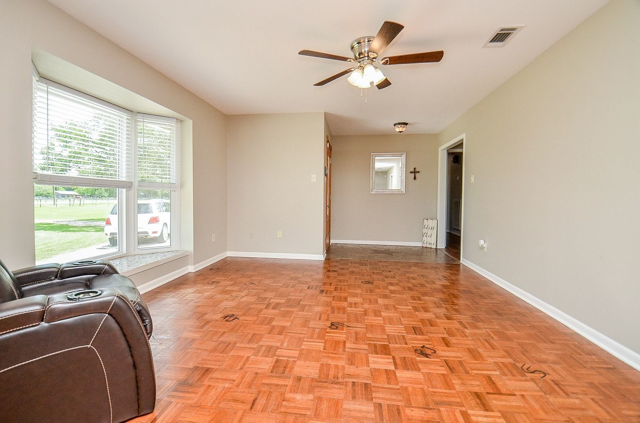 2500 County Road 62 Rosharon, TX 77583 - Photo 10 of 48 a view of a livingroom with a ceiling fan and window