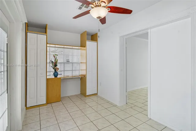 a view of a hallway with a white walls