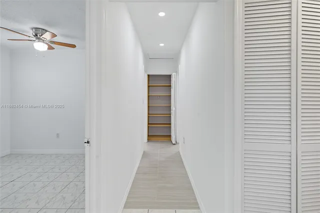 a bathroom with a sink toilet a mirror and shower