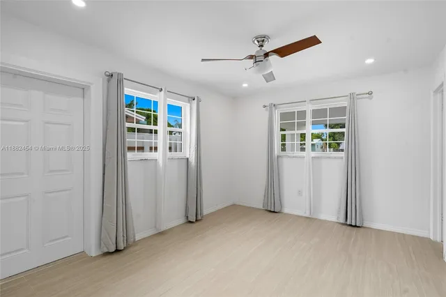 a view of a hallway with closet