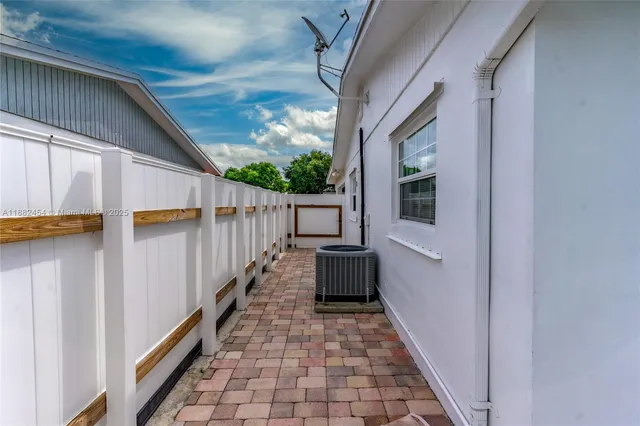 a view of a terrace with sitting area