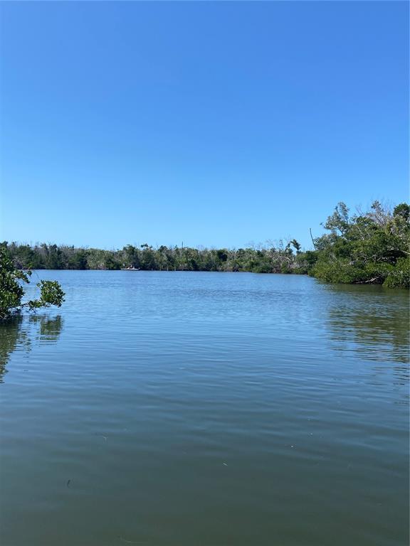 7 Access Undetermined Boca Grande, FL 33921 - Photo 1 of 33 a view of lake