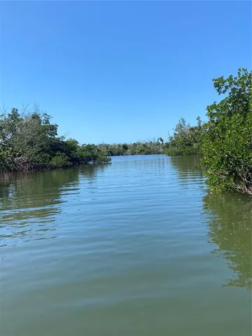 a view of a lake with houses