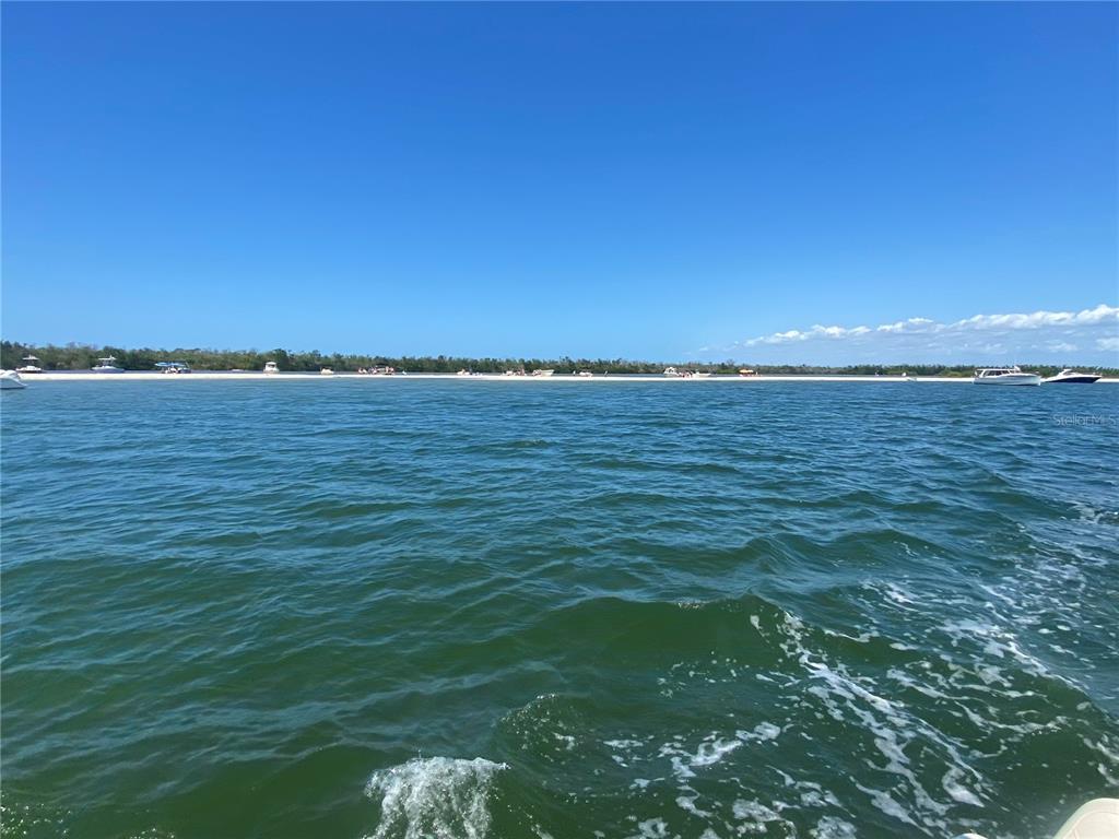7 Access Undetermined Boca Grande, FL 33921 - Photo 27 of 33 a view of an ocean beach and mountain