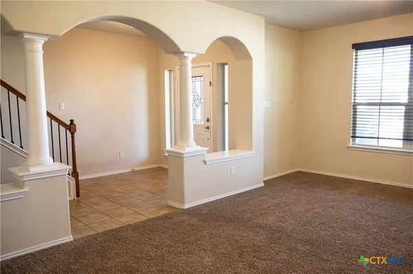 an empty room with windows