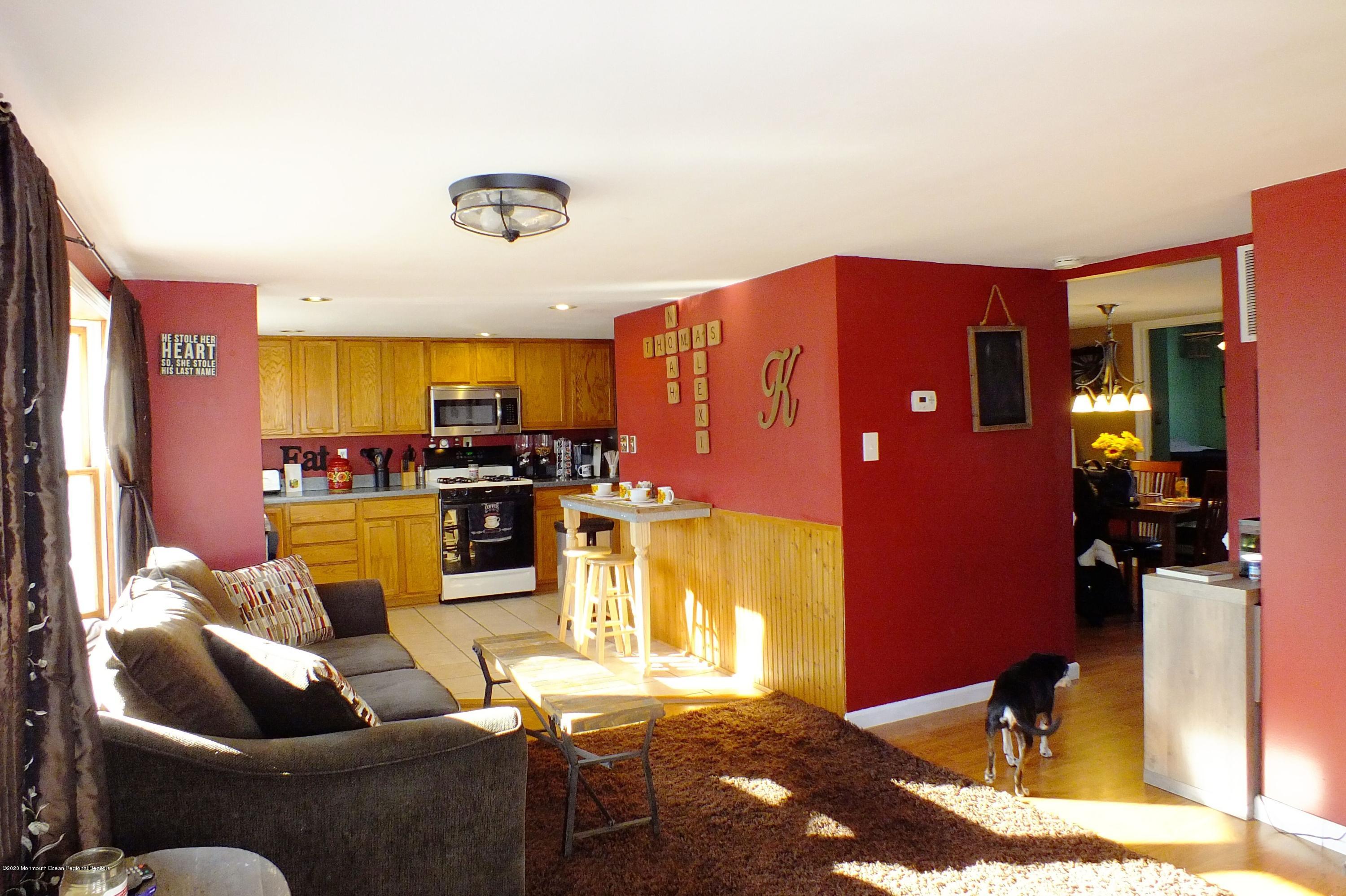 648 Windsor Road Brick, NJ 08723 - Photo 6 of 19 648 Windsor Rd. LR with Kitchen view