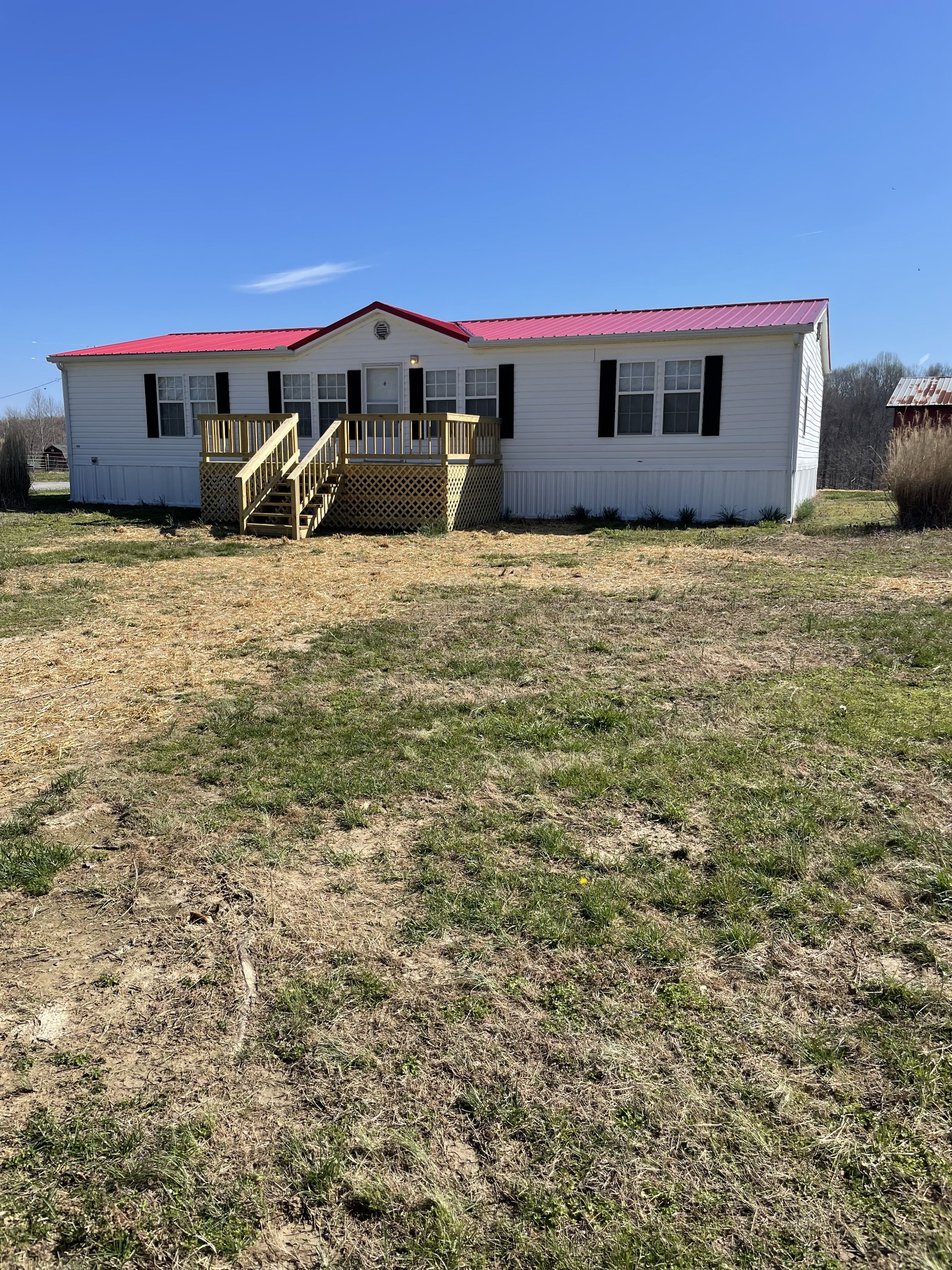 324 Powell Road Red Boiling Springs, TN 37150 - Photo 1 of 13 a house view with a outdoor space