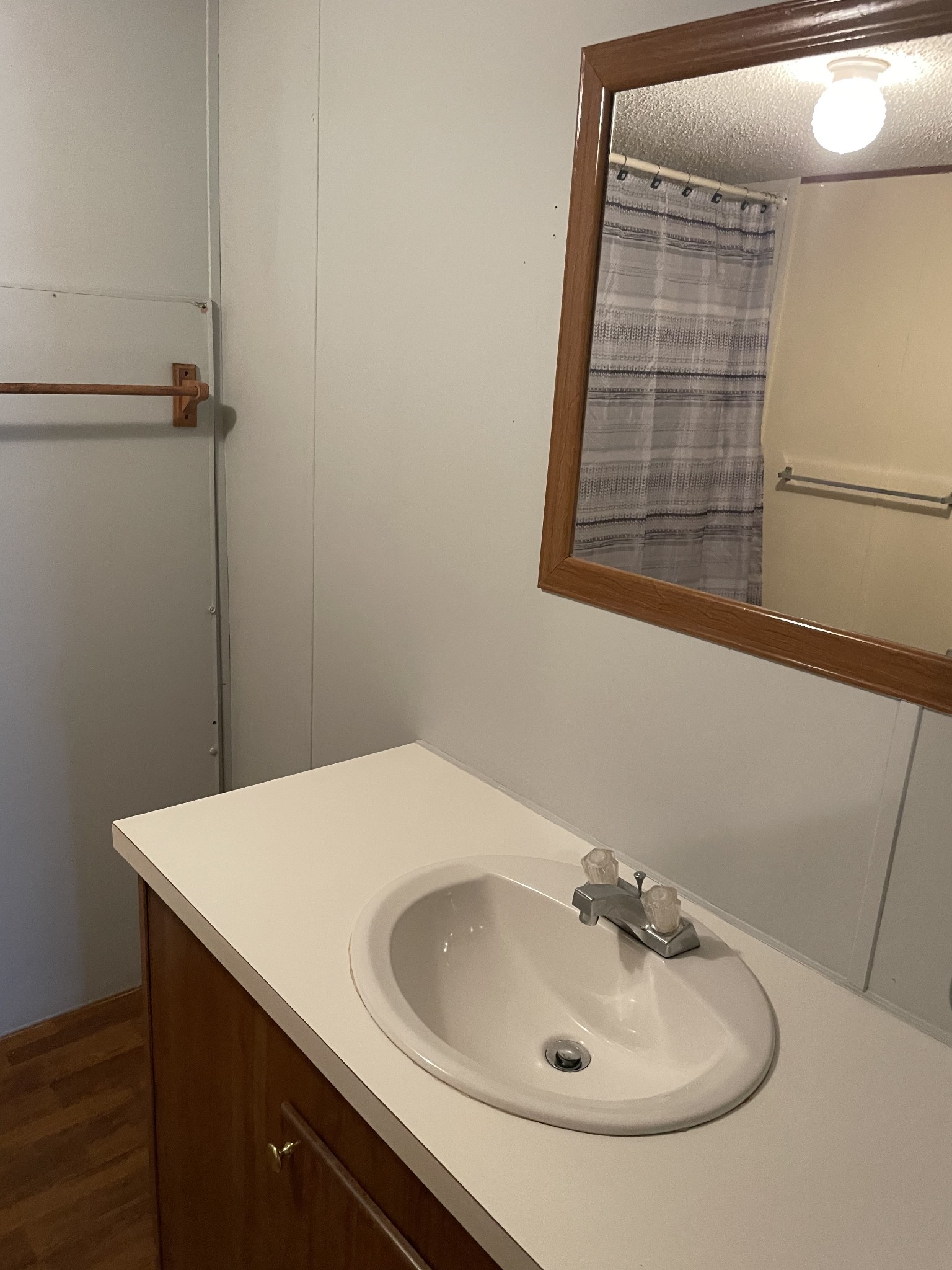324 Powell Road Red Boiling Springs, TN 37150 - Photo 13 of 13 a bathroom with a sink and a mirror