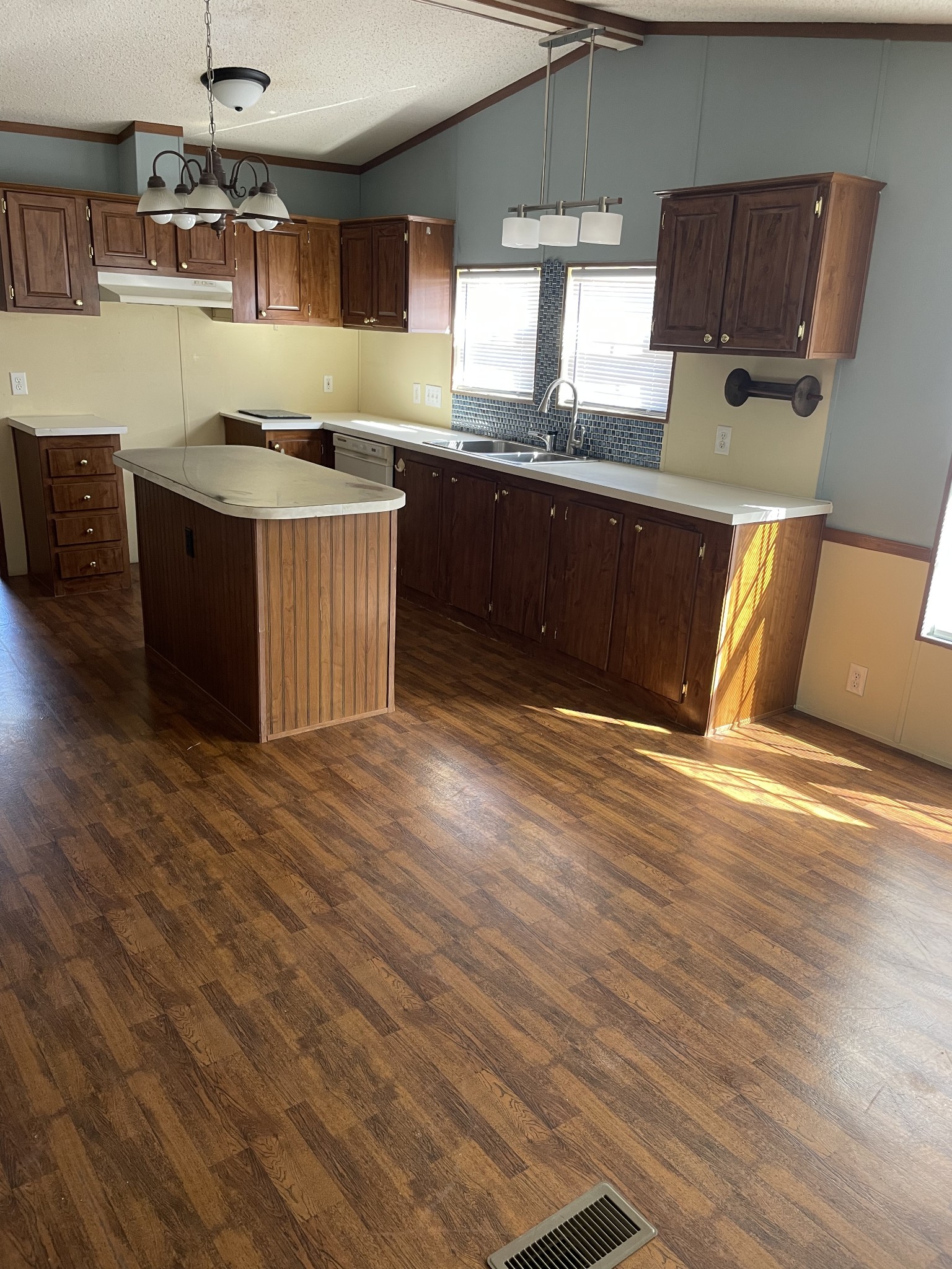 324 Powell Road Red Boiling Springs, TN 37150 - Photo 5 of 13 a kitchen with stainless steel appliances granite countertop a sink counter space and wooden floor