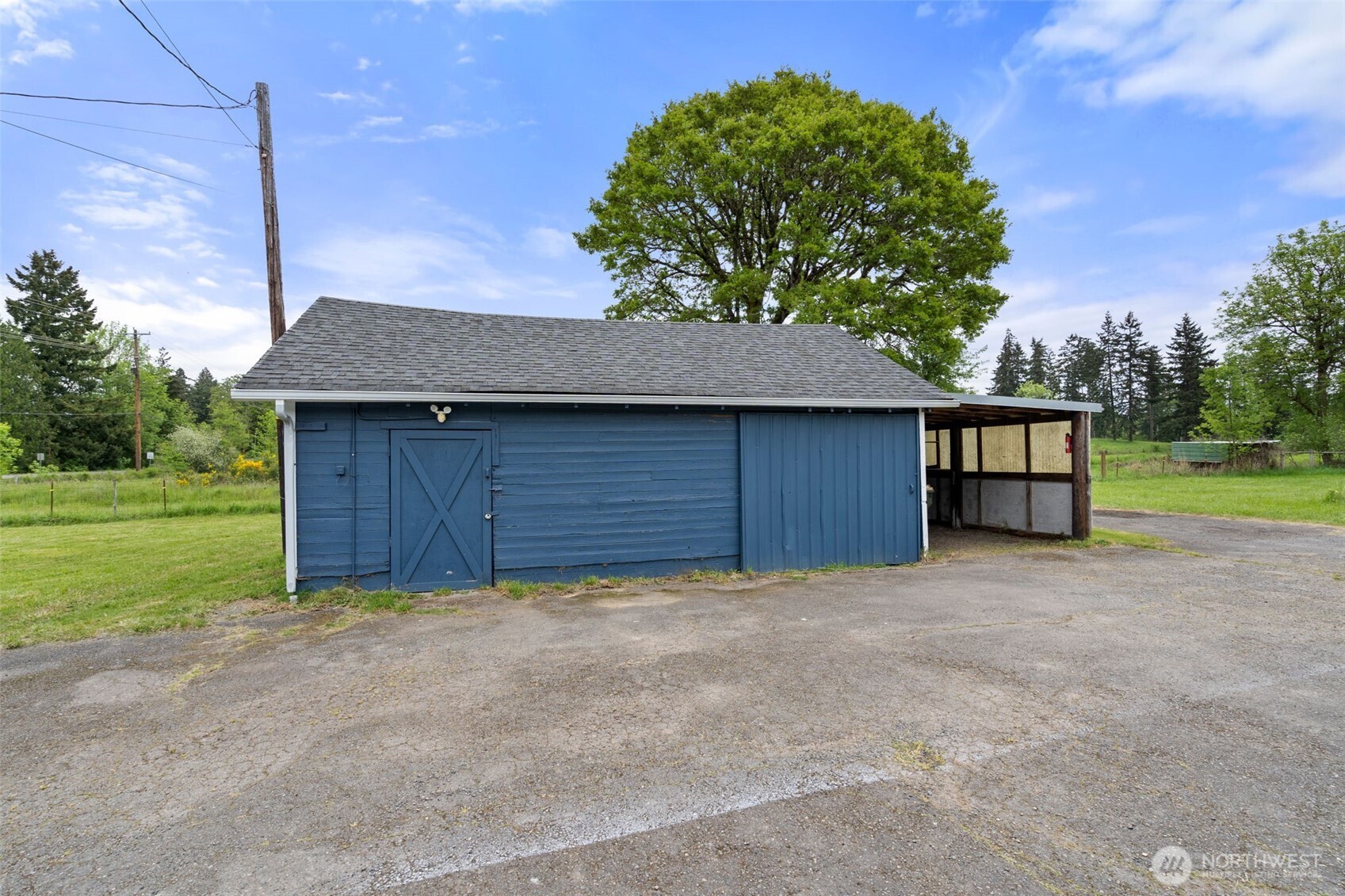 2222 Cooks Hill Road Centralia, WA 98531 - Photo 31 of 36 a view of a house with a yard and garage