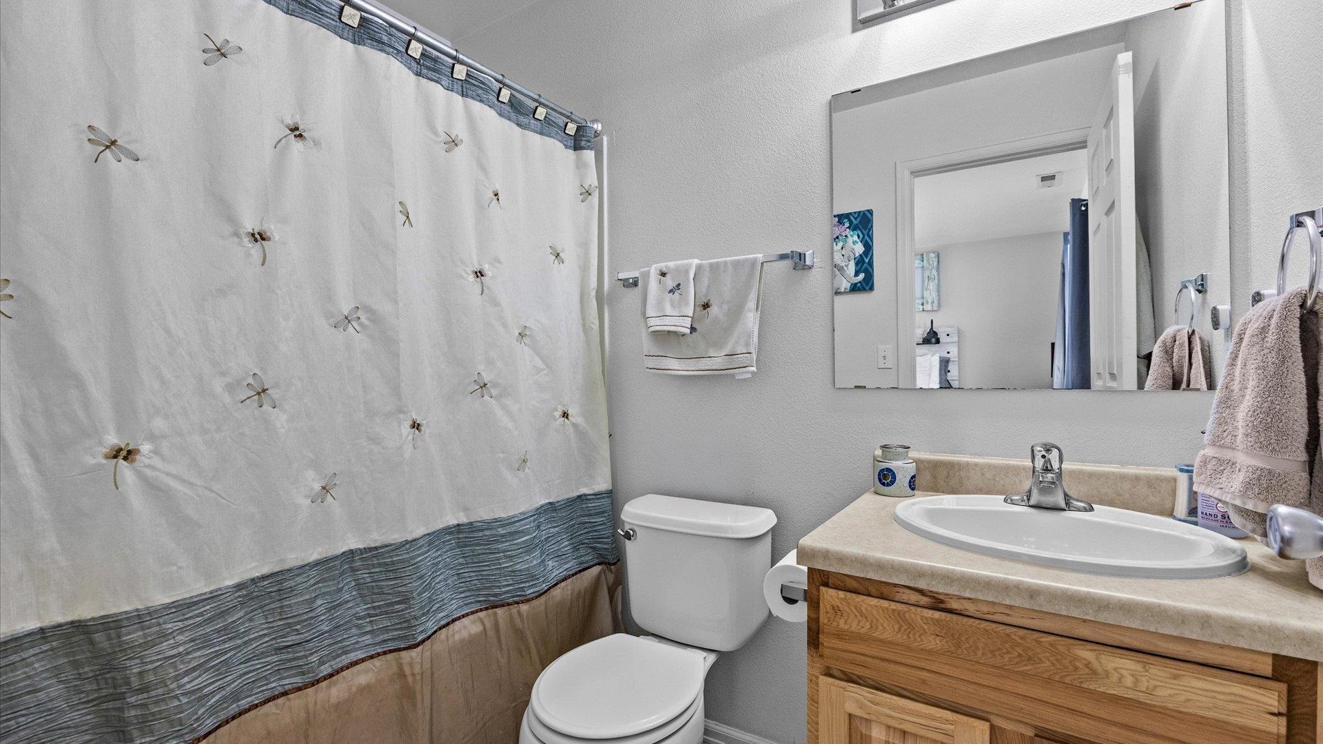 420-29 29 1/2 Road Grand Junction, CO 81504 - Photo 16 of 26 a bathroom with a granite countertop sink toilet and shower