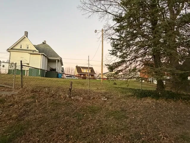 a view of house with garden
