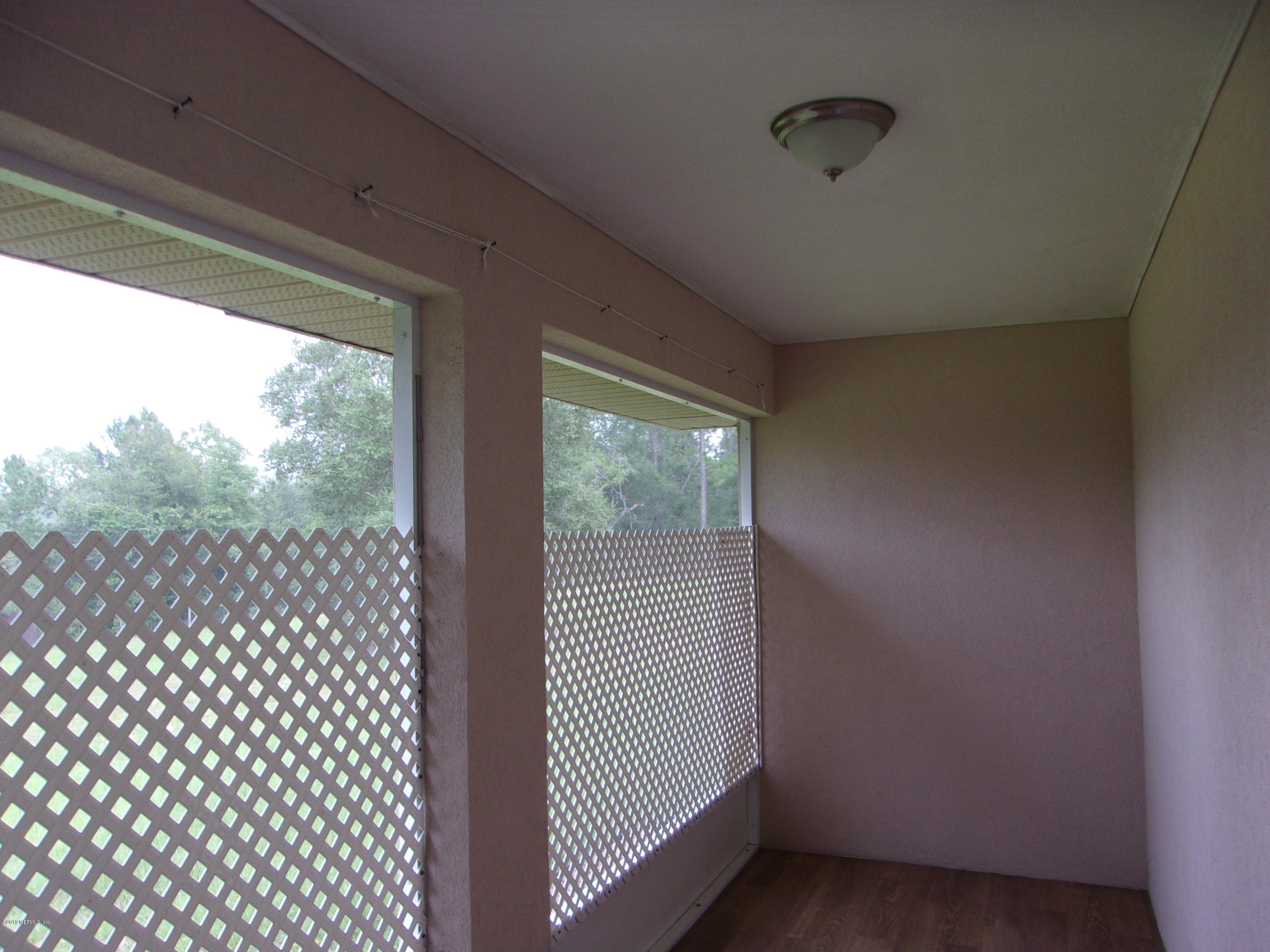 882 Southeast 46th Loop Keystone Heights, FL 32656 - Photo 16 of 23 porch2