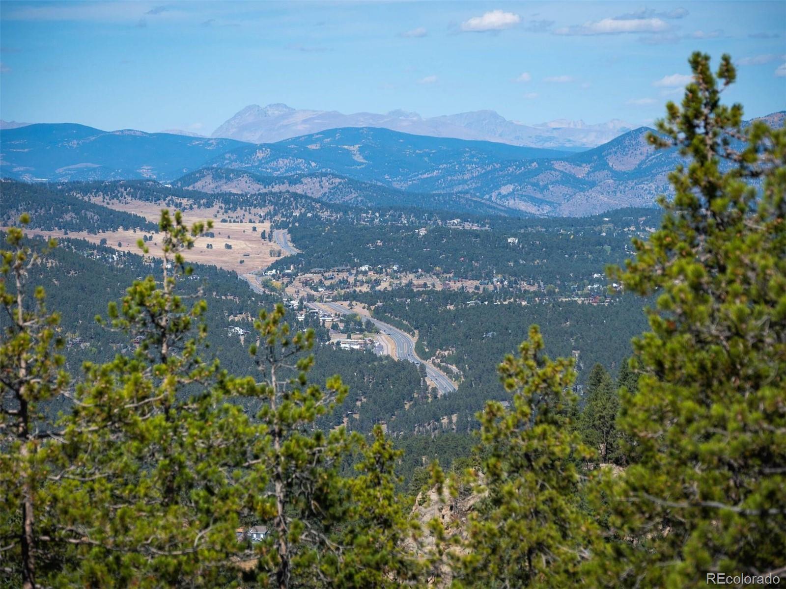 6371 Canyon Creek Road Evergreen, CO 80439 - Photo 29 of 50 a view of city and mountain