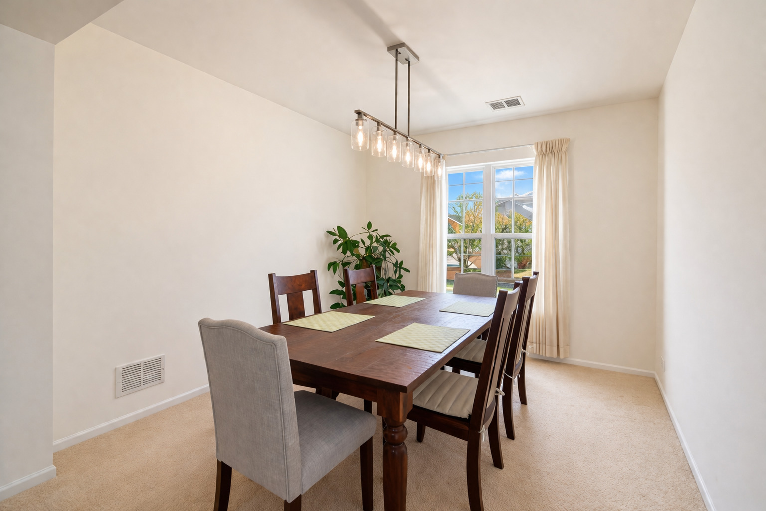 1204 Georgetown Way Vernon Hills, IL 60061 - Photo 11 of 30 a view of a dining room with furniture window and wooden floor