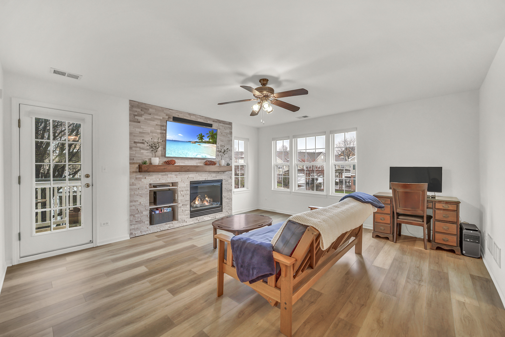1204 Georgetown Way Vernon Hills, IL 60061 - Photo 12 of 30 a spacious bedroom with a bed and a flat screen tv
