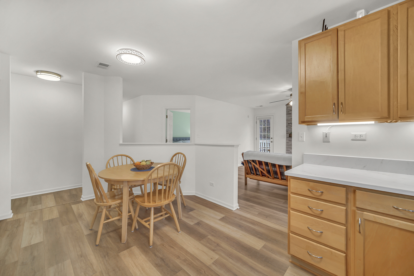 1204 Georgetown Way Vernon Hills, IL 60061 - Photo 19 of 30 a dining room with furniture and wooden floor
