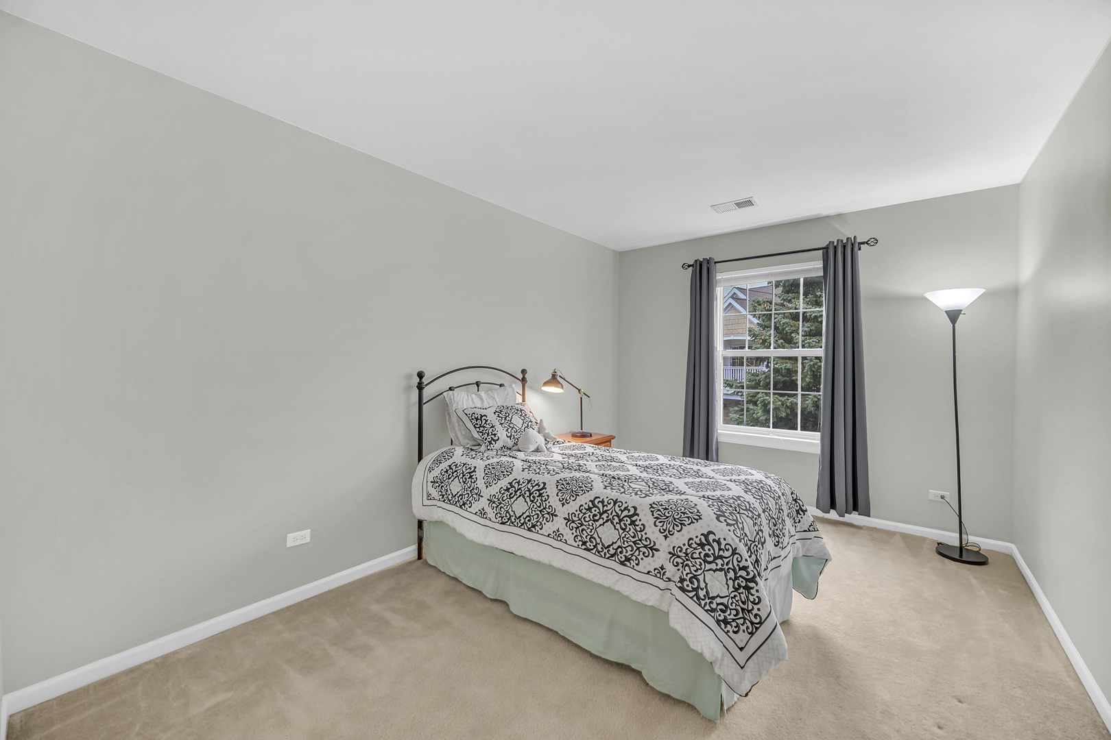 1204 Georgetown Way Vernon Hills, IL 60061 - Photo 23 of 30 a bedroom with a bed and a window