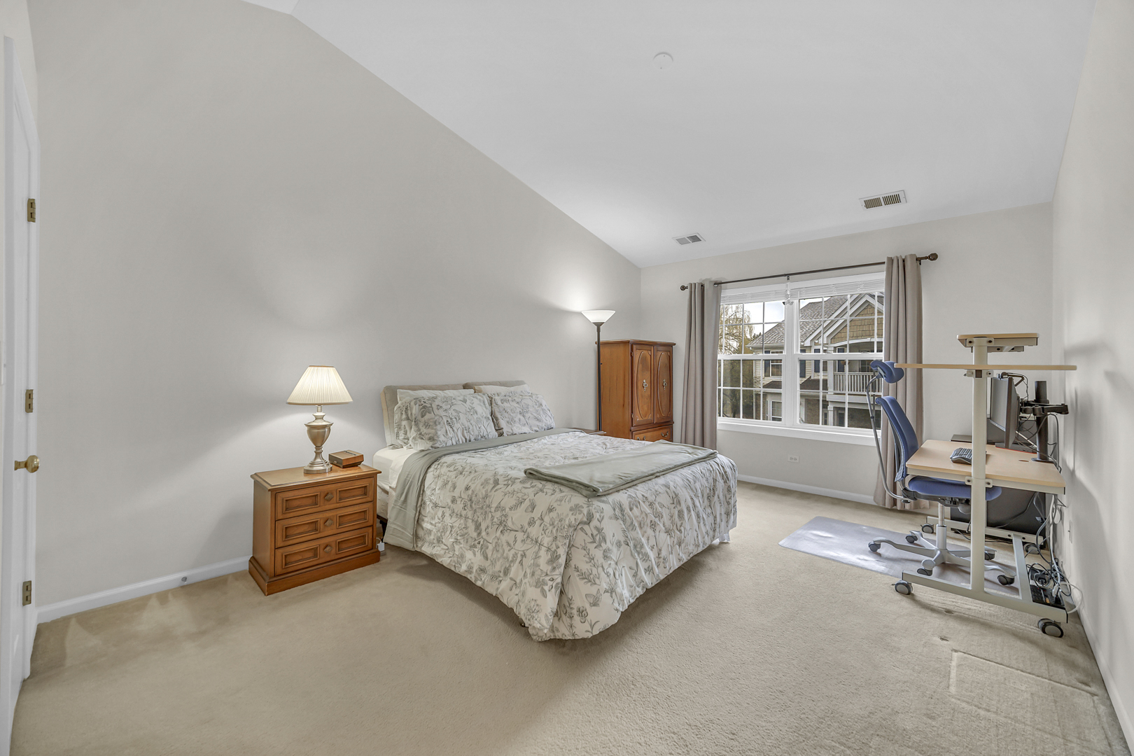 1204 Georgetown Way Vernon Hills, IL 60061 - Photo 25 of 30 a bedroom with a bed and large window