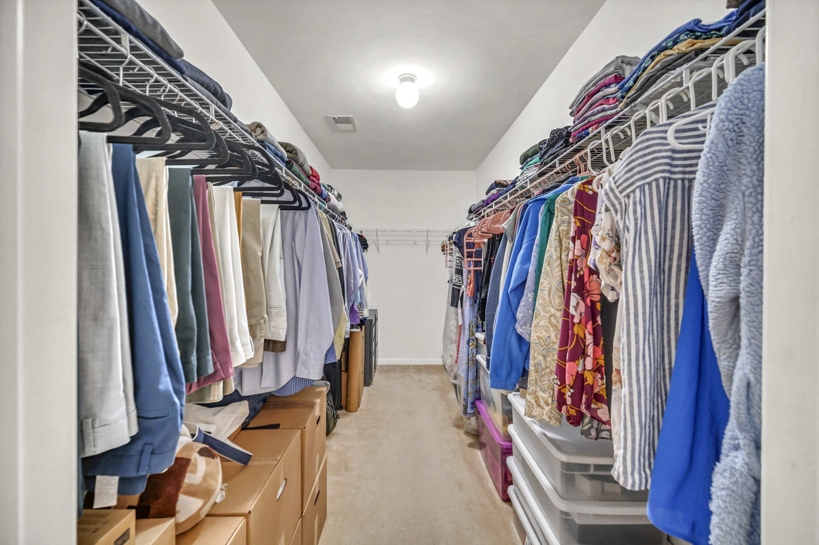 1204 Georgetown Way Vernon Hills, IL 60061 - Photo 27 of 30 a view of walk in closet with clothes